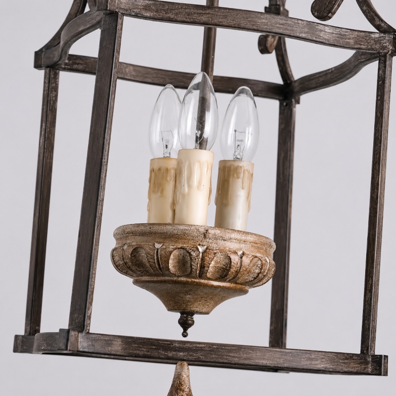 Close view of E14 candle sockets inside the rustic birdcage pendant lamp