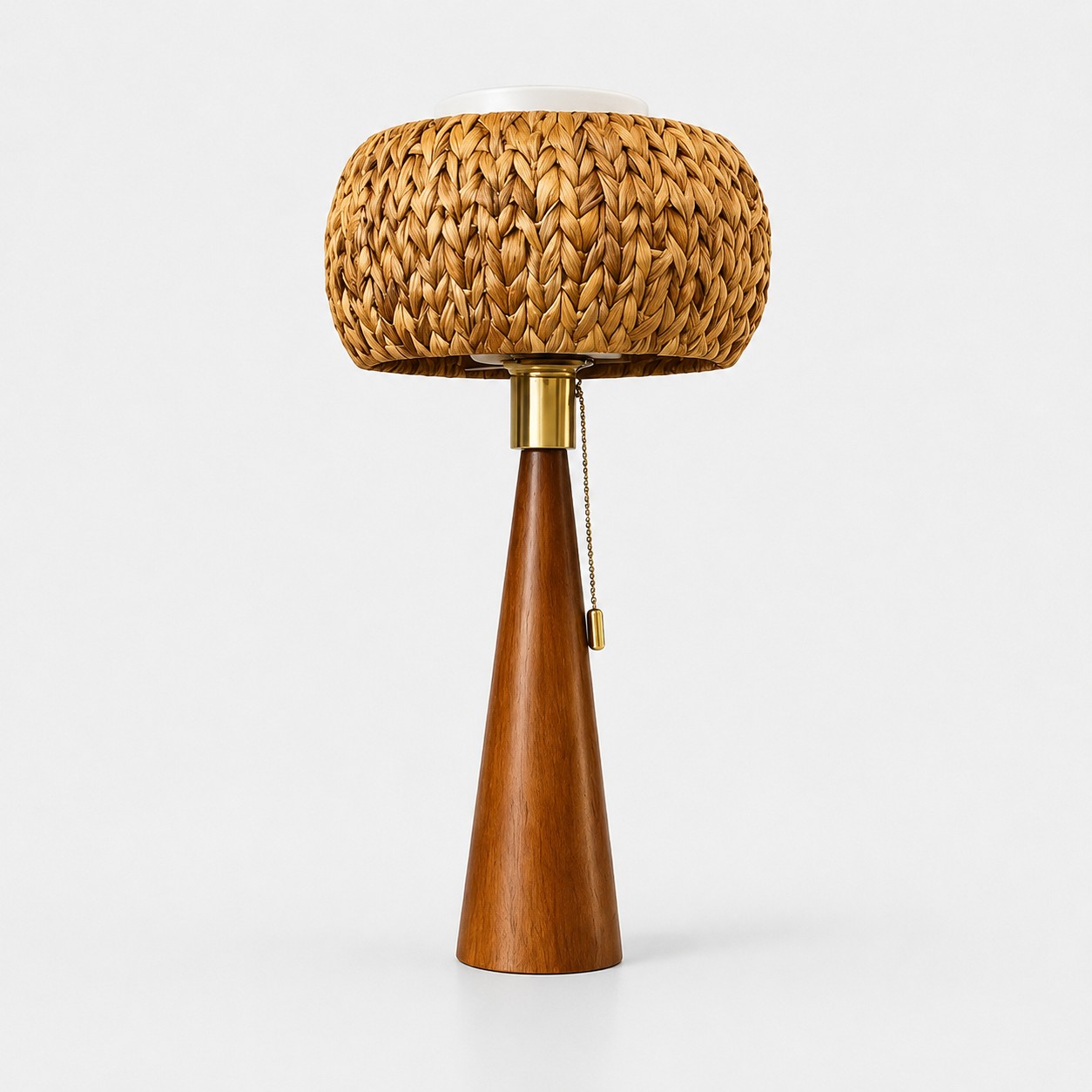 Full view of the woven natural fiber and wood pull-chain table lamp